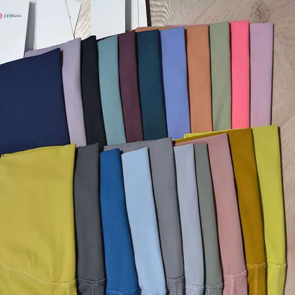 Atuendo de yoga caliente Lu-06 Leggings deportivos con damas Sin líneas embarazosas Alinear 22 colores Fitness Pantalones de yoga lindos Cintura alta Jogg 69