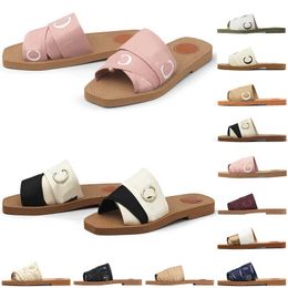 Hotsale Sandalias de mujer Zapatos de diseñador Zapatillas de deporte Woody Mules Zapatillas Diapositivas planas Tejido cruzado Sandalias de goma de verano Sandalias de playa Peep Toe