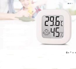 Huishoudelijke binnenkant precisie digitale thermometers en hygrometer instrument met lachende gezicht elektronische temperatuur-hygrometer RRF13255