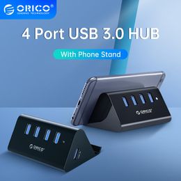Hubs Orico 5 Gbps High Speed Mini 4 ports USB3.0 Splitteur de moyeu pour ordinateur portable de bureau avec support de support pour tablette de téléphone PC noir / blanc