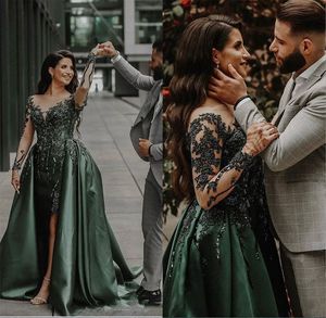 Hunter Emerald Green Evening Formele jurken 2024 Luxe Luxe lange mouw kralen Lace sexy spleet Arabische gelegenheid prom -jurk met overskirt