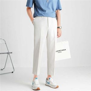 Pantalones de traje de seda de hielo para hombre, pantalones de vestir de negocios informales finos de verano sueltos, pantalones sociales de oficina de nueve puntos para hombre, blanco 210527