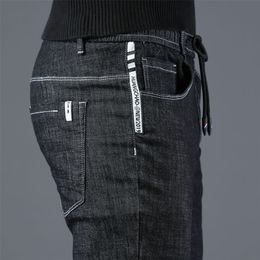Icpans Korea Skinny Jeans Men Slim Fit zwart blauw elastisch taille potlood denim broek mannen voorjaar zomer 201128