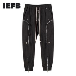 IEFB Hoge kwaliteit Male broek Streetwear Multi Zipper Trend Heren Casual Pants Drawtring Elastische taille enkellengte broek 220509