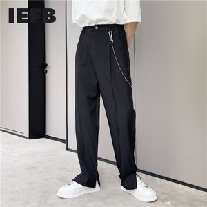 IEFB Tendencia coreana Pantalones de traje básico con cadena Tobillo de los hombres Diseño de apertura Casual Pantalones blancos negros 9Y7521 210524