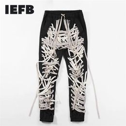 IEFB / vêtements pour hommes haute rue Patchwork cordes Bandage homme Pantalon taille haute Casual Slim Pantalon Streetwear Fashion Tide 210317