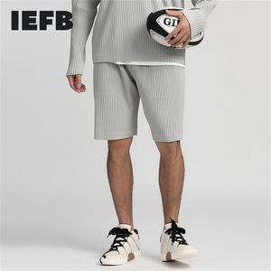 IEFB/vêtements pour hommes style japonais tissu extensible mince lâche décontracté genou longueur pantalon plissé élastique taille short mâle 9Y3051 210629