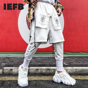 IEFB lente winter verdikte causale broek voor mannen losse nep twee stukken patchwork heren sweatpants elastische wachtbroek 210524