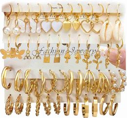 IFKM 24 paires de boucles d'oreilles créoles dorées pour femmes et filles, hypoallergéniques, grosse chaîne, créoles ouvertes torsadées, paquets de boucles d'oreilles pendantes pour fête d'anniversaire, bijoux tendance de Noël