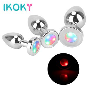 Ikoky lichtgevende buttplug volwassen games prostaat massage dildo heldere metaal anale stimulator s/m/l sexy speelgoed voor vrouwen