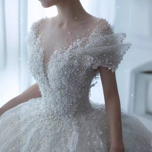 Illusion corsage manches courtes une ligne robes de mariée cristal dentelle appliqué balayage train grande taille robe de mariée robe de novia