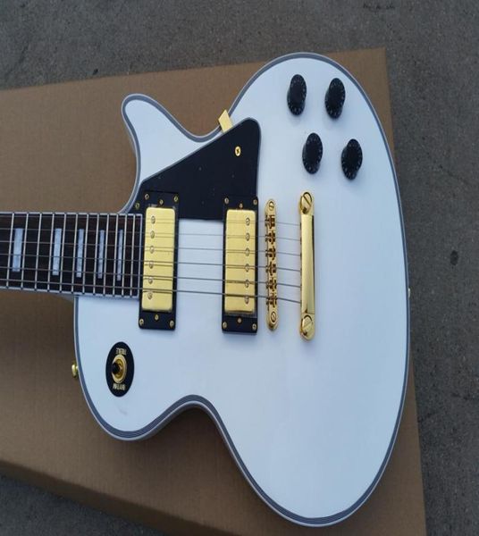 en stock de couleur blanche guitare électrique Chine Shop personnalisée belle et merveilleuse6256011