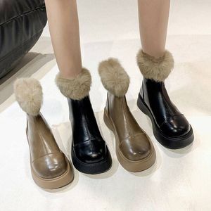 En hiver, les bottes en cuir pour femmes sont à la mode et belles faites à la main en vente directe d'usine