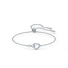 Infinity Heart Sieradencollectie bedelarmbanden roségouden toon en rhodium afwerking heldere kristallen