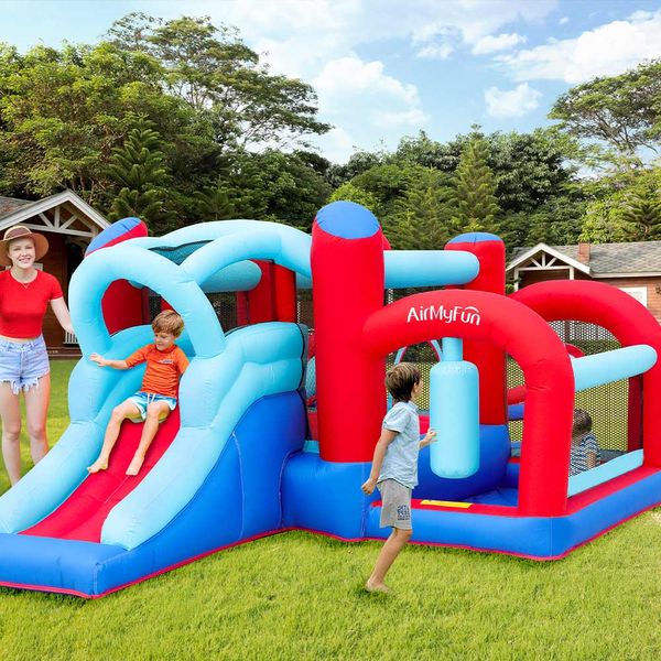 Toboggan gonflable de château sautant avec la maison de rebond de ventilateur videur d'enfants avec la fosse à balles maison de jeu intérieure extérieure gonflable à vendre jouets de parc enfants amusants de jeu en plein air