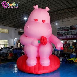 Position assise gonflable, Hippopotame rose, événement d'ouverture du modèle de centre commercial pneumatique, décoration d'hélice, dessin animé IP Animaux mignons