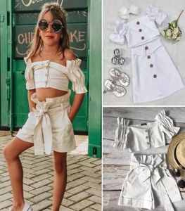 Ins Baby Girls Summer White Outfits 2020 New Baby Kids Dew Dew épaule Puff Shirtbows Shirts Shorts Jupe 2PCS SETS A22623044025
