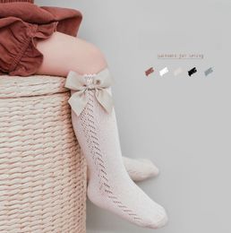 Ins baby enfants creux en tricot à tricot Haute chaussette de mode Fashion Mabes à main les chaussettes de trou désossé en espagne