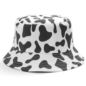 INS lindo Reversible Negro Blanco Patrón de estampado de vaca Sombreros de cubo Hombres Mujeres Sombrero de pesca de verano dos lados Gorra de pescador Viaje Panama1206T