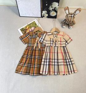 INS Girls plaid jurken Engeland Style Kids Bow Tie Rapel Korte Mouw Pleated Dress 2024 Zomer kinderen katoenen rooster kleding S1307