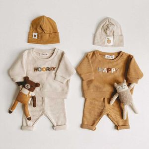 Ins. Vêtements pour enfants coréens Pulls pour hommes et femmes Version Waffle Baby Clothes Ensemble de deux pièces pour vêtements d'extérieur