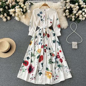Ins-stijl lente en zomer nieuwe high-end printing modieuze en slanke passende temperament met een enkele borsten jurk grote swing lange rok