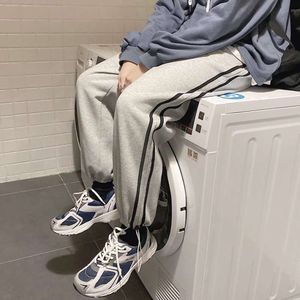 Pantalones casuales de hip-hop de Instagram para la versión de primavera/verano de los hombres, la versión coreana de la calle, legupidos de la calle taventosa pantalones de pierna recta suelta