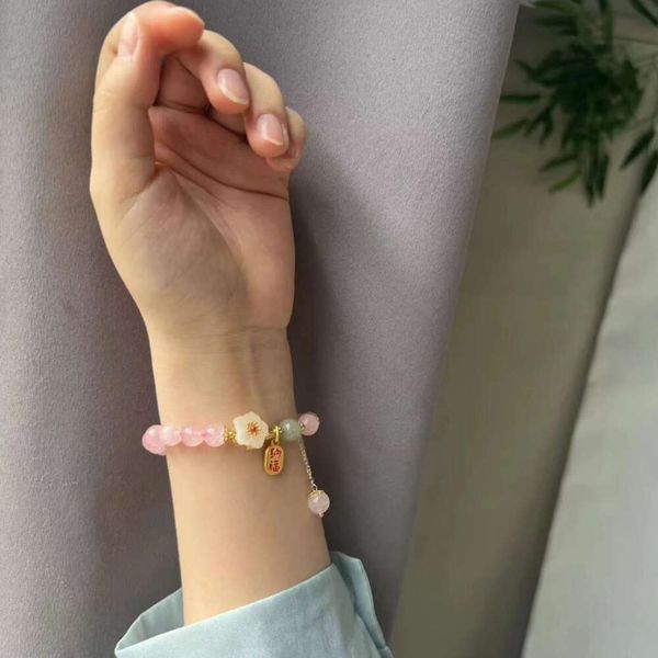 Instagram New Chinese Crystal Loop Single Loop White's White's Jade Peach Blossom Couleur préservant les petits bracelets à glands