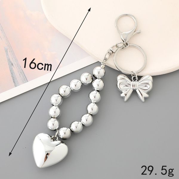 Instagram New Silver plaqué UV Perle Pendant Love Love Bow Perle Pendante Mobile Phone Hanging Corde Luggage Keychain Accessoires