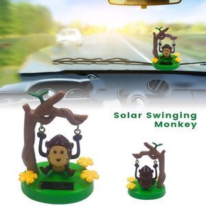 Decorazioni interne 1 pz Danza ad energia solare Animale carino oscillante Scimmia animata Giocattolo Accessori per lo styling dell'auto Decorazione Giocattoli per bambini Regalo