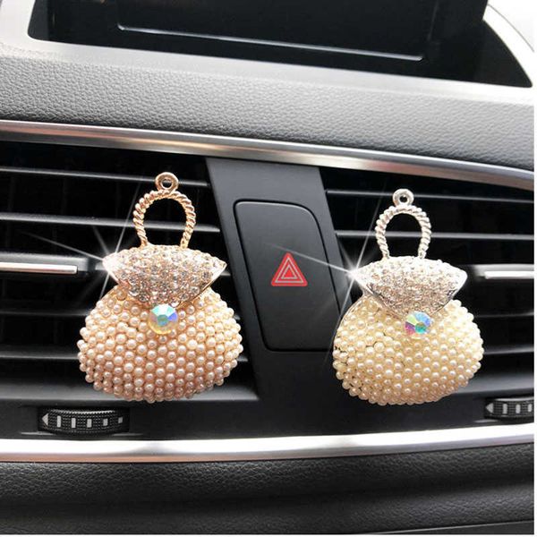 Decoraciones interiores Ambientador de coche salida de aire aleación bolsa de perlas clip de perfume de aromaterapia difusor automático accesorios de interior de coche 0209