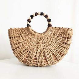 Sac tissé en paille ronde creuse Instagram de célébrité d'Internet, sac de lune, sac à main avec poignée en perles de bois, sac de plage de vacances de style forêt de grande capacité 240315