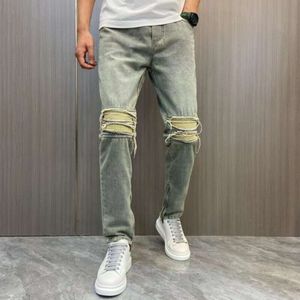 Celebridad de Internet Instagram Marca de moda Jeans con parches desgastados para hombres Pantalones de pierna recta negros con parches de temporada con pantalones de calle con cremallera