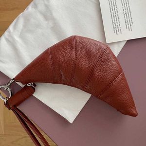 Onregelmatige nieuwe lijn online rood dezelfde mode schouder veelzijdige donkere dumpling vorm ontwerper handtas handtas multi -kleuren handheld crossbody tas voor vrouwen