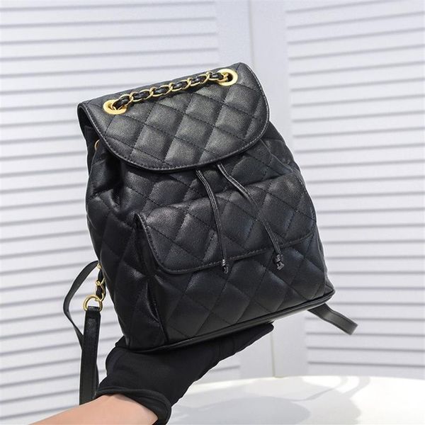 Italia Mochila acolchada clásica para mujer Bolsos de cuero de caviar Piel de becerro Cuero real Hardware de metal dorado Bolsos de cubo con cordón Lar276G