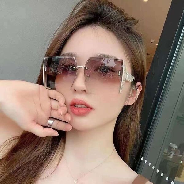 Título del artículo Gafas de sol de moda con montura cuadrada grande para mujer, a prueba de rayos UV, personalidad sin marco, tendencia coreana