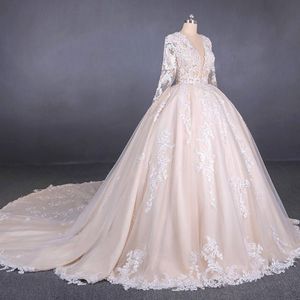 Ivoire / Blanc manches longues robe de billes dentelle mariage robe Deep V-Line Chapelle Robes de mariée avec long train