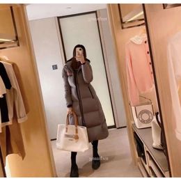 Veste Femme Down Designer Vêtements Famille Femmes Parka d'hiver en plein air Long manteau chaud à capuche