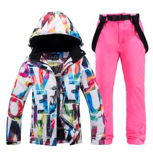 Chaquetas Traje de esquí para niña más barato Ropa de invierno para snowboard al aire libre Chaquetas y baberos impermeables a prueba de viento para nieve Pantalones de esquí para mujer