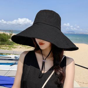 Japon et Corée du Sud Big Brim Hat Womens Spring Summer Foldable Travel Soleil Couleur continue Couleur décontractée Fisherman 240423