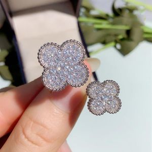 Anillo de flor doble de diamante completo de Japón y Corea del Sur tamaño de apertura de las mujeres entre los dedos regalo de los amantes Net Red Live Jewelry R297o