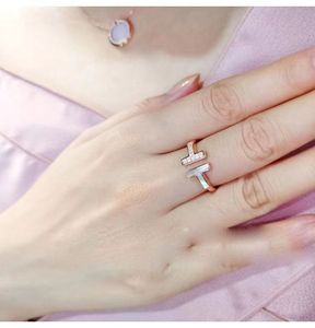 Japan und Südkorea Einfachheit CNC Desinger Tiff Ring Damenmode Titan Stahl vergoldet Roségold Paare Großhandel