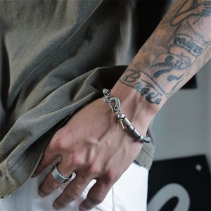 Japonais fait à la main en acier au titane Vintage Patchwork Bracelet hommes rue Hip-Hop Niche Design à la mode marque breloque bijoux