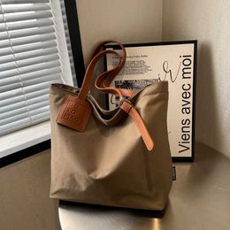 Japanse Koreaanse Instagram Sail Bag Minimalistische contrasterende draagtas Damesschoudertas met grote capaciteit 240315