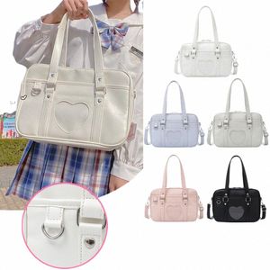 Japonais Lolita Coeur JK Sacs d'uniforme scolaire Femmes Cuir Femme Étudiant Sac à main Cosplay Anime Love Creux Out Sac à bandoulière m7gS #