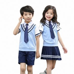 Style japonais Étudiant Filles Garçons Uniformes Scolaires Faux Deux Pièces Top Jupe Plissée Cott Shorts Ensemble Graduati Costumes K4kE #