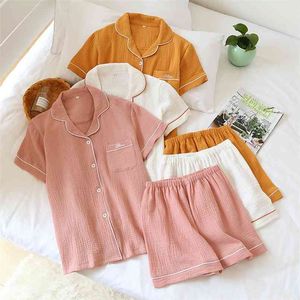 Couple d'été japonais pyjamas costume coton crêpe dames couleur unie simple chemise à manches courtes shorts hommes service à domicile 210809