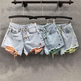 Jeans 2022 Portas de mezclilla de verano de primavera Fashion Fashion Botón de empalme suelto Holte Casual High Leg Bip Leg K331