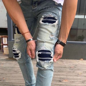 Jeans Amirs arrivées pantalons perforés de luxe Jeans Coolgoy pantalons de vélo hommes collants de mode Rock Revival lettre pantalon 981