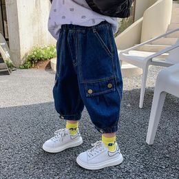 Jeans Boy's Hebilla Primavera y verano Moda coreana para niños Pantalones casuales Cómodos pantalones cortos de 9 puntos Venta al por mayor y al por menor
